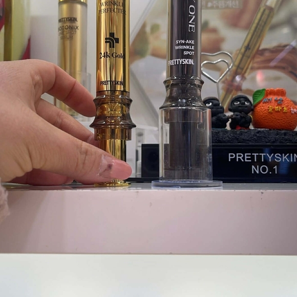 Gold Skincare Serum by [Brand] - Picture 2 of 4